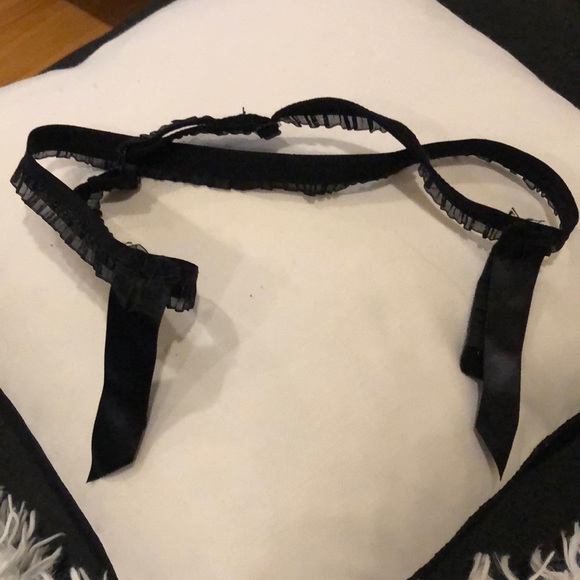 Lingerie item. Adjustable. Black. Not sure exactly what you do with it. - Picture 1 of 5